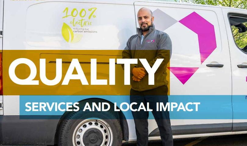 Man Standing By The Side Of An Electric Van