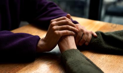 Hands Holding Each Other To Show Support