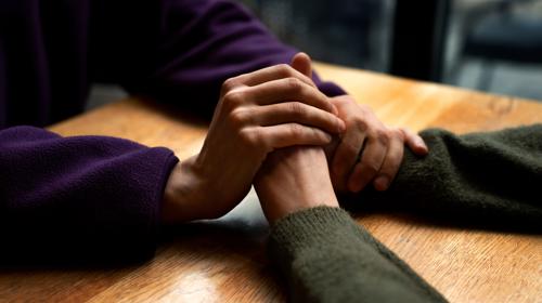 Hands Holding Each Other To Show Support