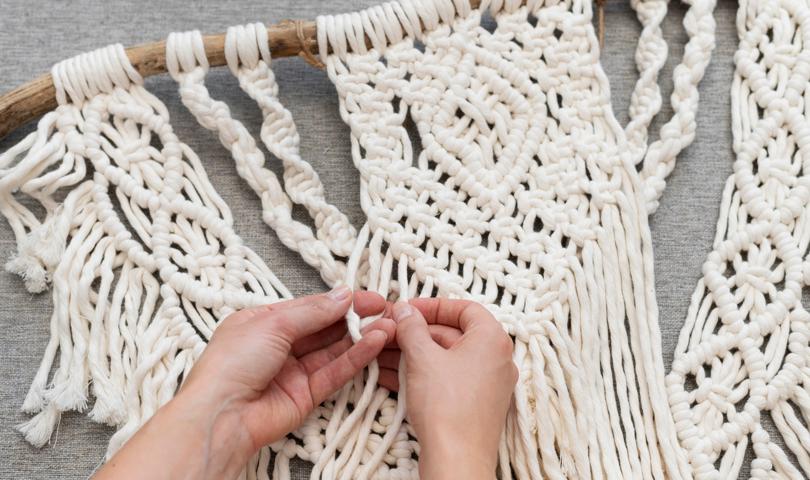 Person Using Macrame Technique (1)