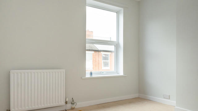 A Bedroom That Has Been Renovated At Fisher St