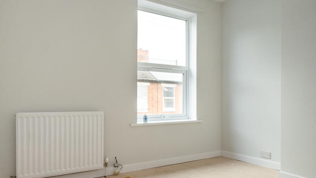 A Bedroom That Has Been Renovated At Fisher St