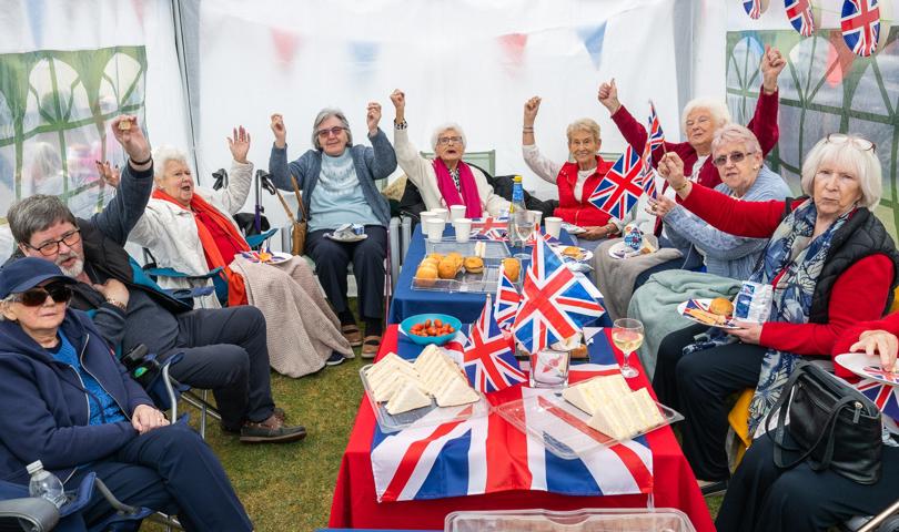 Residents Posing With Union Jack Flags (1)