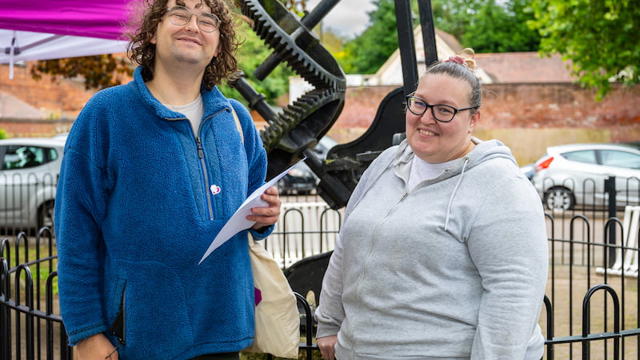 A tenant smiling with a Midland Heart employee
