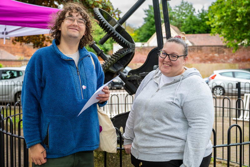 A tenant smiling with a Midland Heart employee