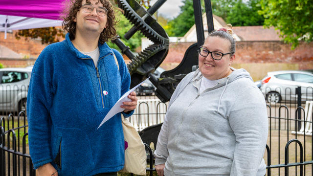 A tenant smiling with a Midland Heart employee
