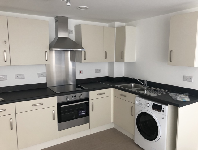 A new kitchen in beige monochrome colours
