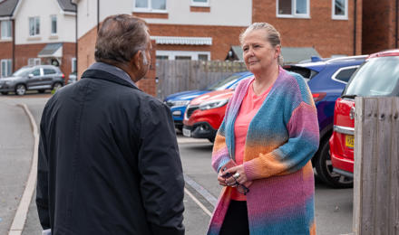 Tenant Speaking To A Midland Heart Employee
