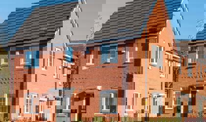 A home at the end of a row in the sunshine