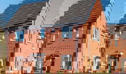 A home at the end of a row in the sunshine