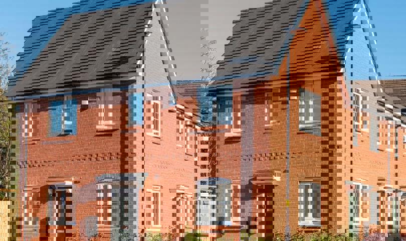 A home at the end of a row in the sunshine