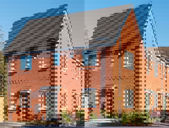 A home at the end of a row in the sunshine