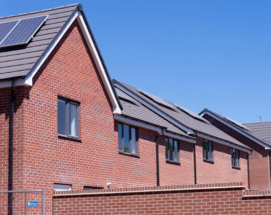 Solar panels on roofs in the sunshine
