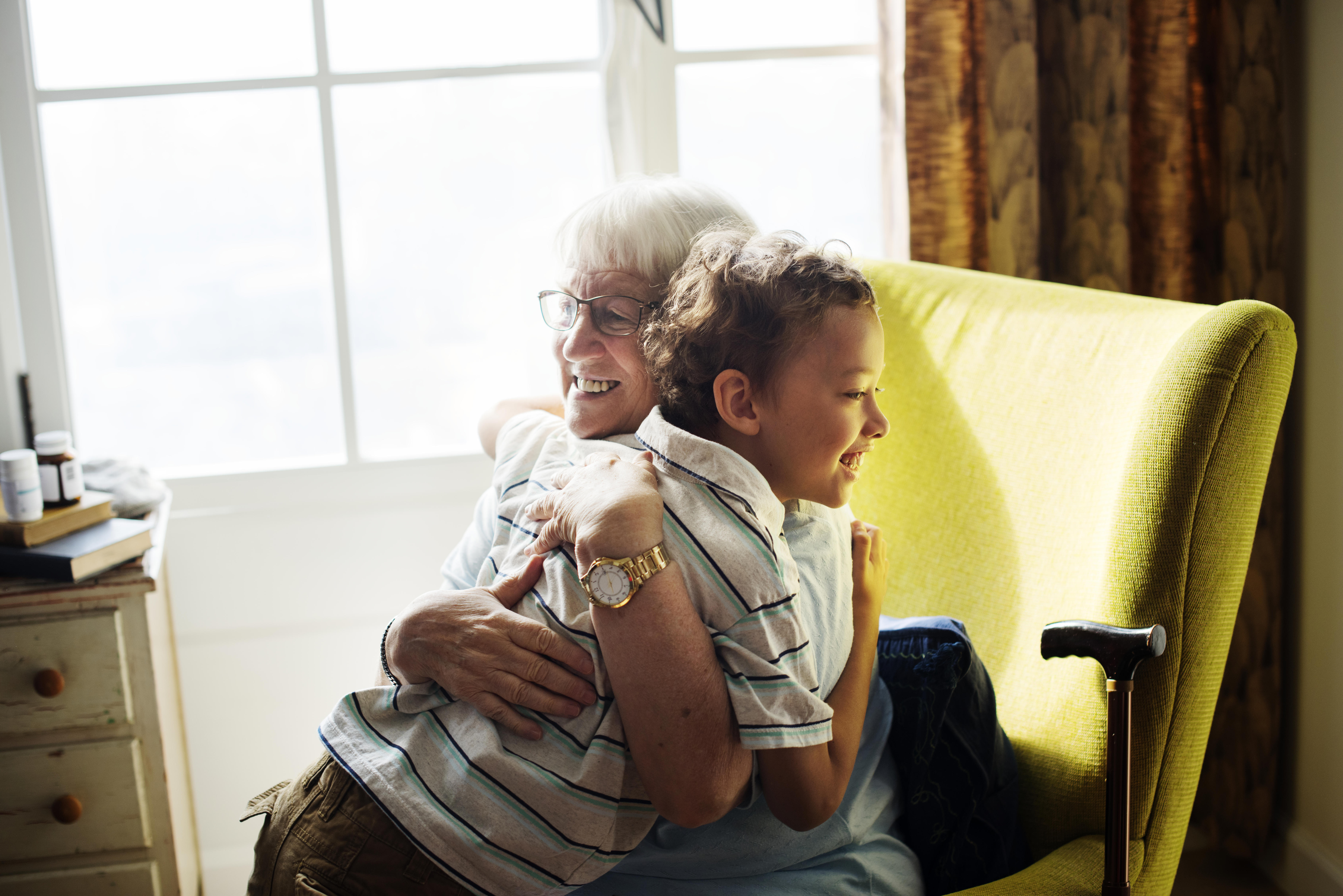 A grandma hugging her grandson