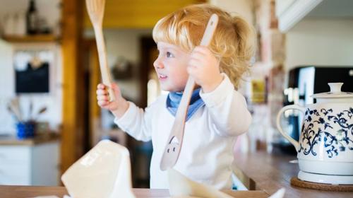 A young child in the kitchen