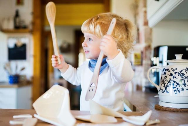A young child in the kitchen