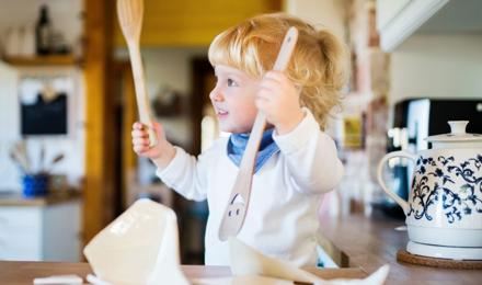 A young child in the kitchen
