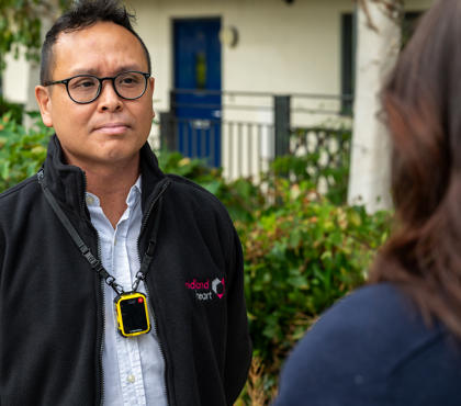 Midland Heart Employee Speaking To A Tenant Wearing A Body Worn Camera