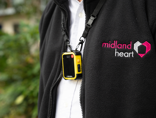 Midland Heart Employee Wearing A Body Worn Camera And Fleece