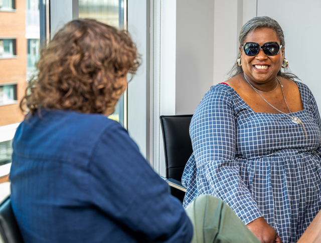 An involved tenant speaking to a Midland Heart employee