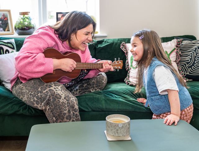 Mom And Daughter Making Music Together