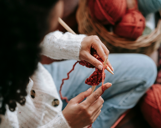 A person knitting A person knitting